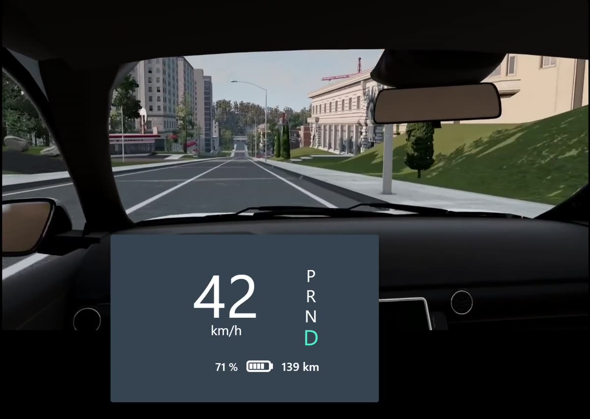 A driving video with a small eco-display that shows speed, gear and a smiley.